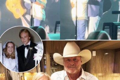 In a moment that melted hearts, Alan Jackson stepped away from the mic and waved his wife, Denise, up to the stage—a rare sight that had the crowd holding their breath. As the first notes of “Remember When” played, the two shared a tender kiss, then swayed together in a quiet slow dance that said more than words ever could. It wasn’t just a performance—it was a love story, unfolding in real time.