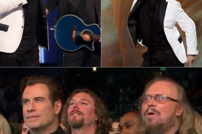 Hollywood Glowed With Nostalgia And Star Power As Music And Film Icons Came Together To Honor The Legendary Bee Gees! At A Spectacular Grammy Salute In Los Angeles, Barry Gibb, Now 70, Took Center Stage At The Microsoft Theater, Proving That His Timeless Voice And Charisma Still Captivate Audiences. Adding To The Magic, John Travolta Joined The Celebration, Reuniting With Gibb In A Moment That Had Fans Reliving The Golden Era Of Disco