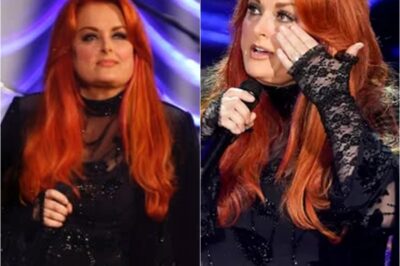 Wynonna Judd stood there, her voice trembling but full of strength, as if each line was mending her own broken heart and that of millions. Together with Ashley, she not only paid tribute to her mother – Naomi Judd – but also offered a sweet prayer to all those who have lost someone. “Love Can Build A Bridge” sounded like a miracle, where love transformed into each note to soothe the pain. And then, at the end of the video, when Wynonna stopped singing, the magic happened – the entire auditorium lit up with an emotional chorus from the guests below, as if embracing her with music, with love. Watching Wynonna lift everyone up in the most painful moment, people could not help but shed tears at that gentle strength. Perhaps it is love, not time, that truly heals the deepest wounds.