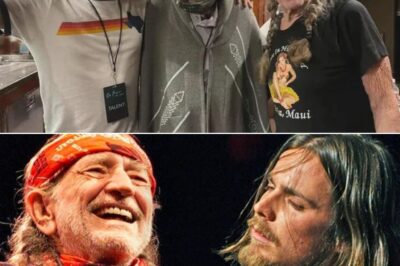 When news broke that Willie Nelson was too ill to perform, a wave of heartbreak swept through the Outlaw Music Festival crowd. But what could have been a somber night transformed into something unforgettable when his son, Lukas Nelson, took the stage with quiet strength. Surrounded by legends like Bob Dylan, Robert Plant, and Alison Krauss, Lukas didn’t just sing — he carried a legacy, pouring soul into every note of “Funny How Time Slips Away.” The audience, initially heavy with worry, soon found themselves witnessing something rare: the passing of a torch not through words, but through pure, unfiltered emotion. In that instant, the spirit of Willie lived on, stronger than ever.
