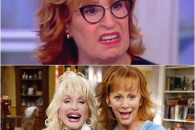 Reba McEntire FIRES BACK at Joy Behar’s SHOCKING Dolly Parton Insult! The gloves are off in Nashville as superstar Reba McEntire unleashes a powerful defense of the beloved Dolly Parton after a stinging and unexpected attack from “The View” co-host Joy Behar. Insiders reveal the depth of Reba’s fury over the perceived disrespect towards a national treasure, igniting a celebrity feud that has the music world buzzing. Prepare for a dramatic showdown as one country queen fiercely protects another, exposing the raw nerves beneath the glittering facade of fame.