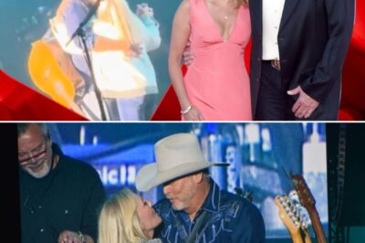 Alan Jackson stepped away from the microphone and waved to his wife, Denise, who joined him on stage. They shared a sweet kiss as they slow-danced to “Remember When.”
